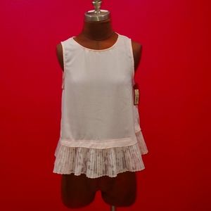 Light pink top with sheer pleated bottom